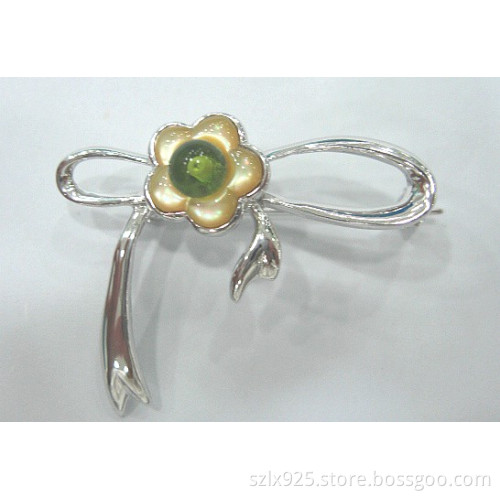 silver brooch with pearls